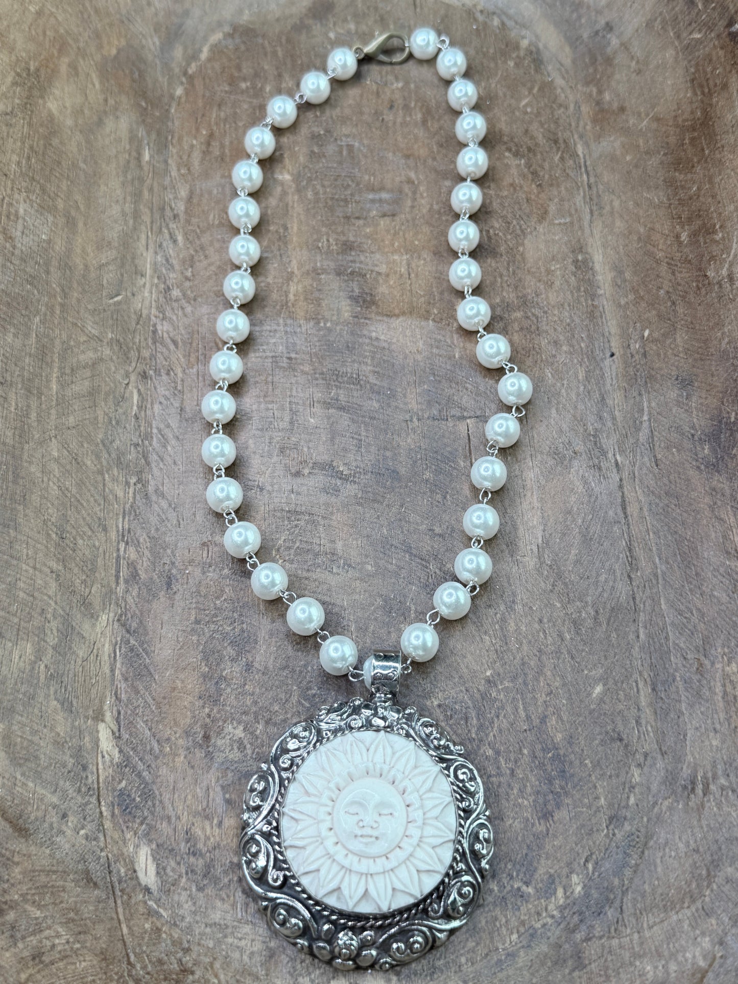 Tibetan Silver Bone-Carved Sleeping Sun Necklace