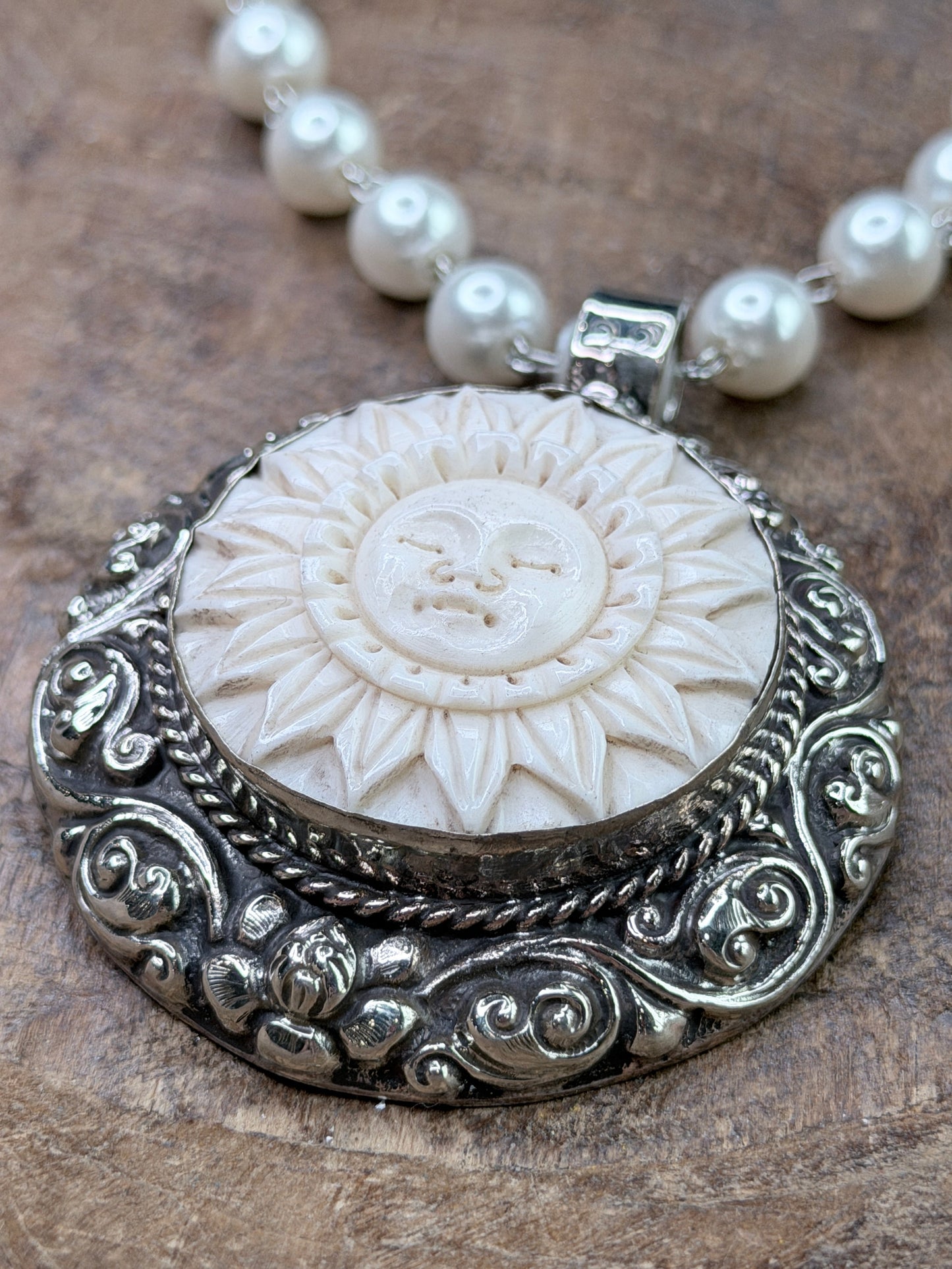 Tibetan Silver Bone-Carved Sleeping Sun Necklace