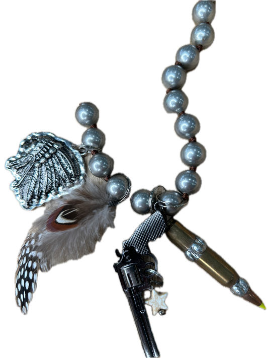 Metal Pistol and Native American-Themed Necklace